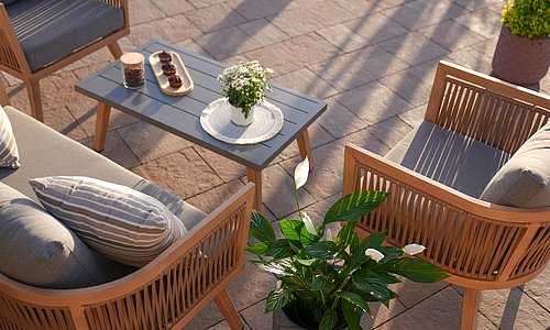 Terrasse mit Gartentisch, Sessel und Pflanzen